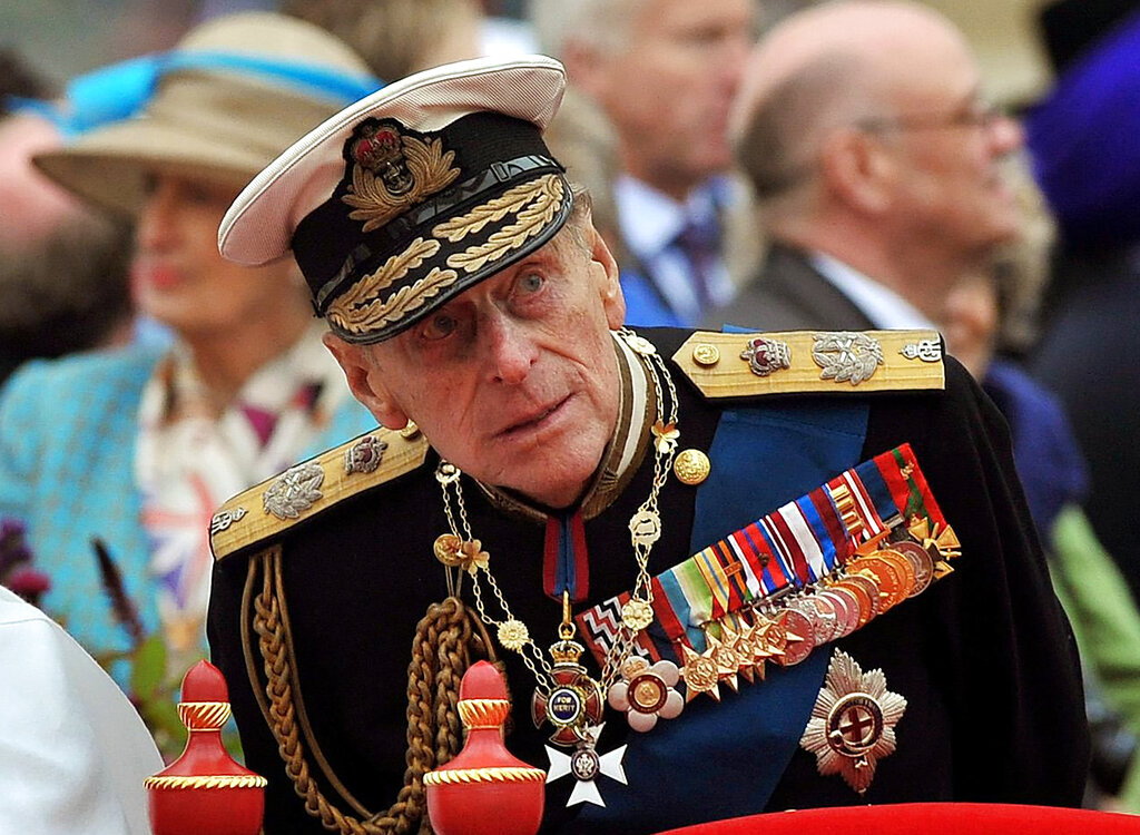 A Sunday June 3, 2012 photo from files showing Prince Philip watching the proceedings from the royal barge during the Diamond Jubilee Pageant on the River Thames in London. (AP Photo/John Stillwell, Pool File)