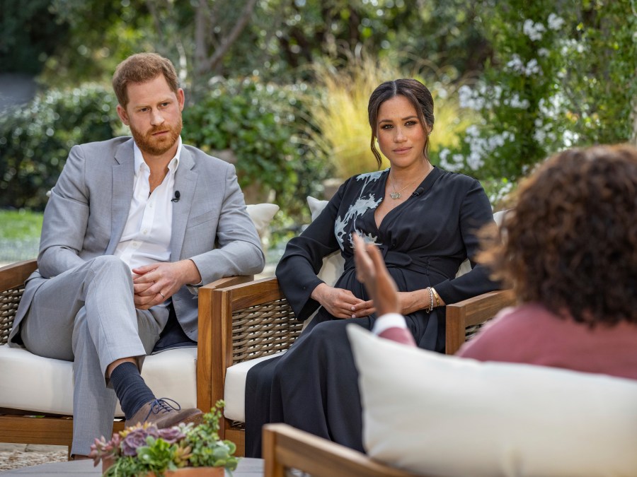 This image provided by Harpo Productions shows Prince Harry, left, and Meghan, Duchess of Sussex, in conversation with Oprah Winfrey. "Oprah with Meghan and Harry: A CBS Primetime Special" airs March 7, 2021. (Joe Pugliese/Harpo Productions via AP, File)