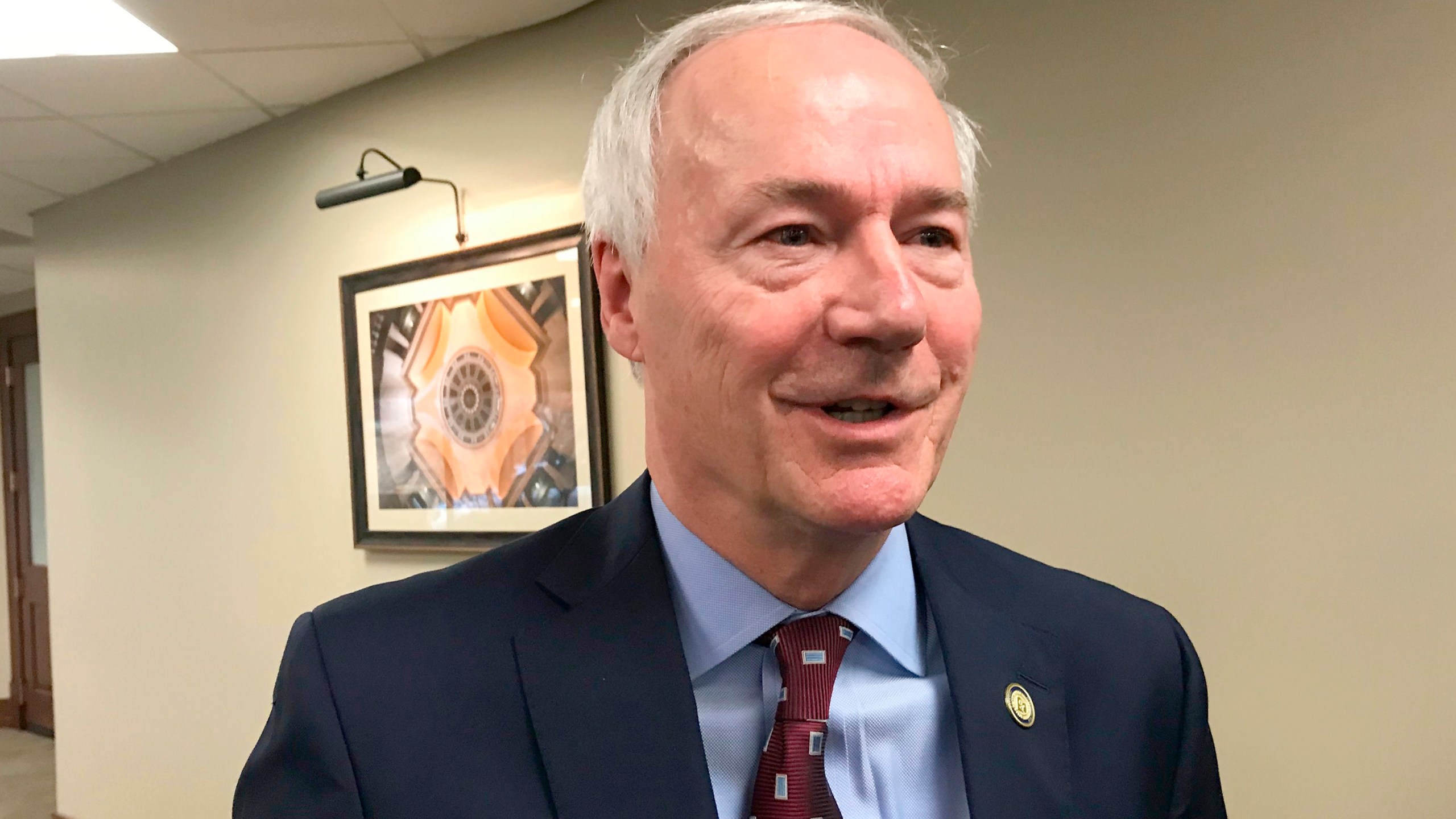 Arkansas Gov. Asa Hutchinson speaks to reporters in Little Rock, Ark., on Jan. 13, 2020. (Andrew Demillo / Associated Press)