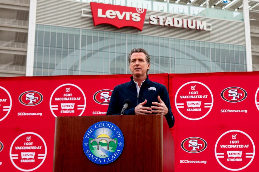 In this Feb. 9, 2021, file photo, California Gov. Gavin Newsom speaks at a press conference outside of Levi's Stadium, in Santa Clara, Calif., before the opening of the largest mass coronavirus vaccination site in the state. (Karl Mondon/Bay Area News Group via AP, File)