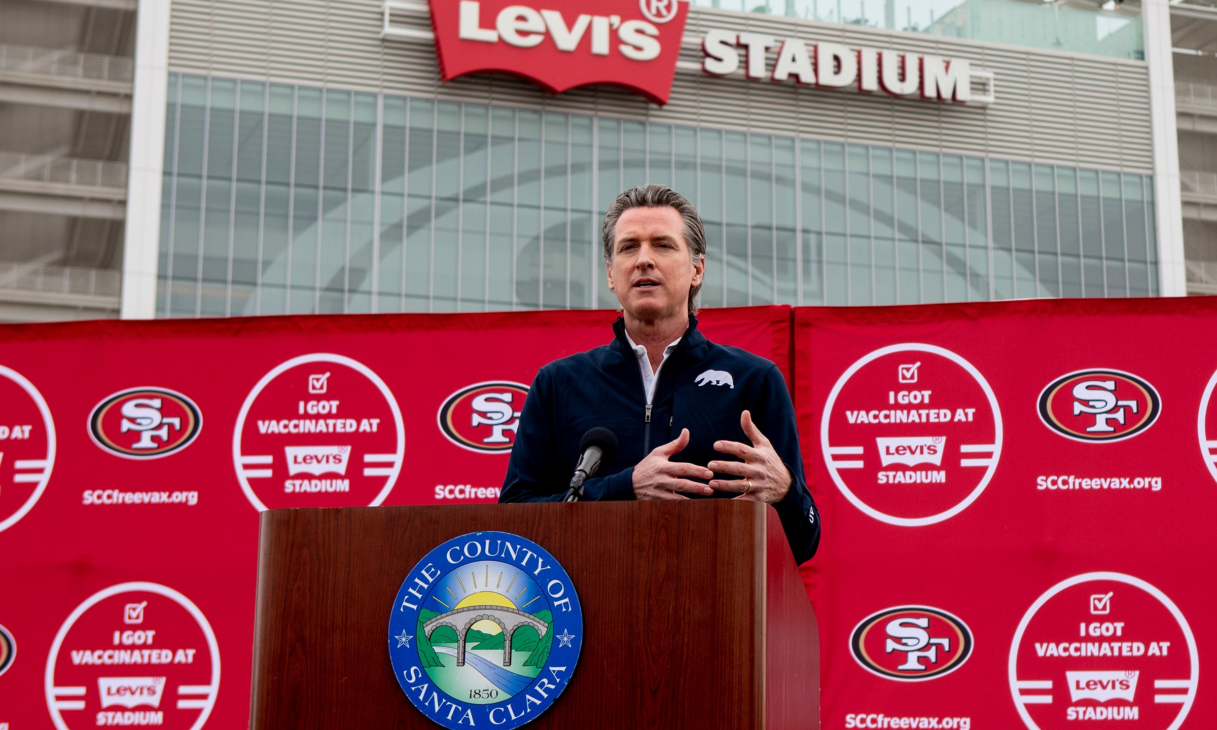 In this Feb. 9, 2021, file photo, California Gov. Gavin Newsom speaks at a press conference outside of Levi's Stadium, in Santa Clara, Calif., before the opening of the largest mass coronavirus vaccination site in the state. (Karl Mondon/Bay Area News Group via AP, File)