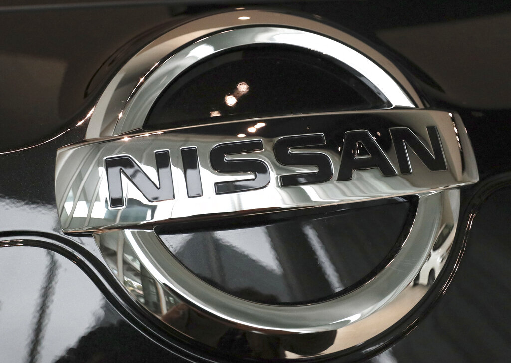 In this Feb. 9, 2017 file photo, the logo of the Nissan Motor Co. is seen on a car displayed at the gallery of its global headquarters in Yokohama, near Tokyo. (AP Photo/Shizuo Kambayashi, File)