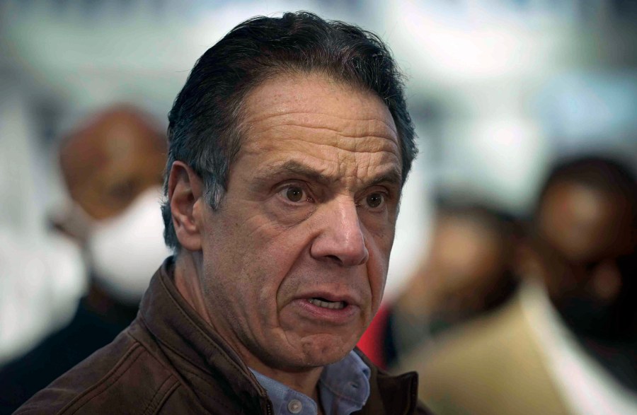 This Monday, March 8, 2021, file photo shows New York Gov. Andrew Cuomo speaking at a vaccination site in New York. A sixth woman has come forward alleging that Cuomo inappropriately touched her late last year, during an encounter at the governor's mansion. (AP Photo/Seth Wenig, Pool, File)