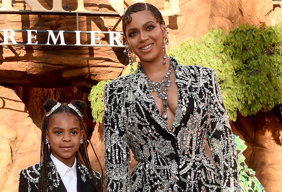 Beyonce, right, and her daughter Blue Ivy Carter arrive at the world premiere of "The Lion King" in Los Angeles on July 9, 2019. (Chris Pizzello/Invision/AP, File)