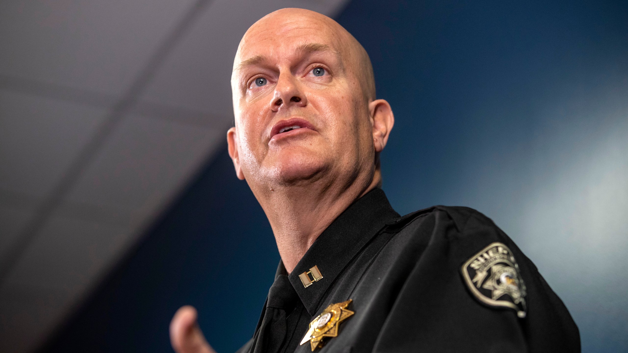 Captain Jay Baker, of the Cherokee County Sheriff's Office, speaks about the arrest of Robert Aaron Long during a press conference at the Atlanta Police Department headquarters on March 17, 2021. (Alyssa Pointer/Atlanta Journal-Constitution via Associated Press)