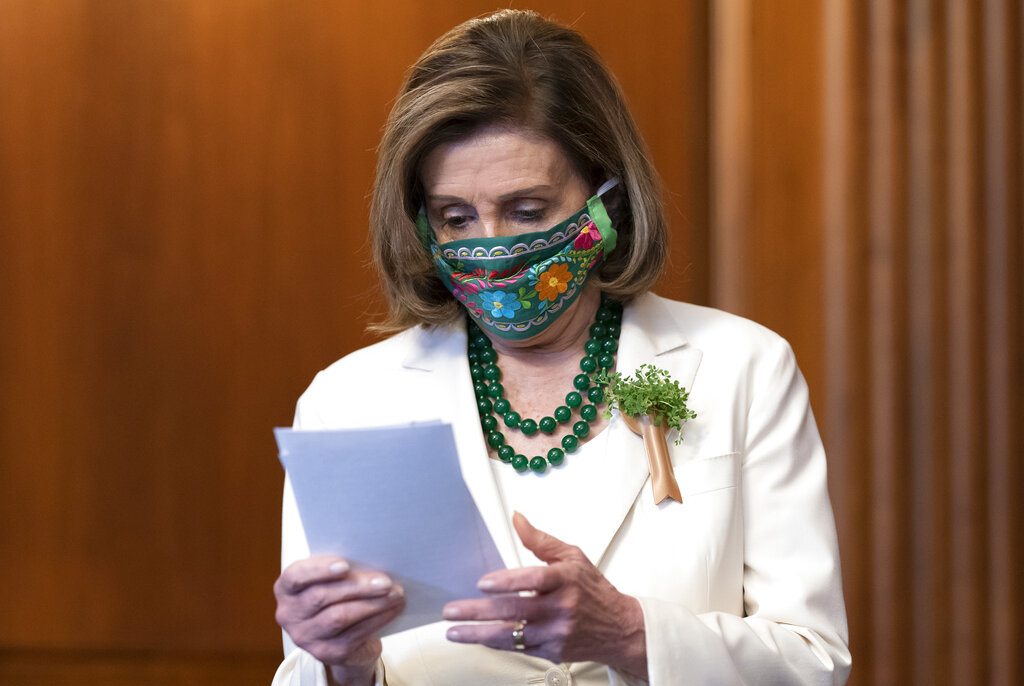 Speaker of the House Nancy Pelosi, D-Calif., looks over her notes at a news conference on reauthorizing the Violence Against Women Reauthorization Act, at the Capitol in Washington, Wednesday, March 17, 2021. (AP Photo/J. Scott Applewhite)