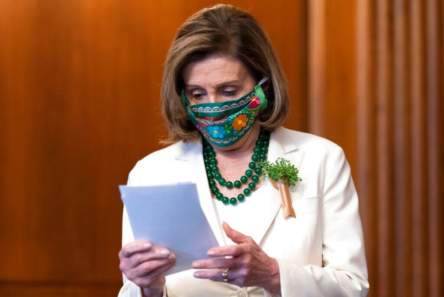 Speaker of the House Nancy Pelosi, D-Calif., looks over her notes at a news conference on reauthorizing the Violence Against Women Reauthorization Act, at the Capitol in Washington, Wednesday, March 17, 2021. (AP Photo/J. Scott Applewhite)