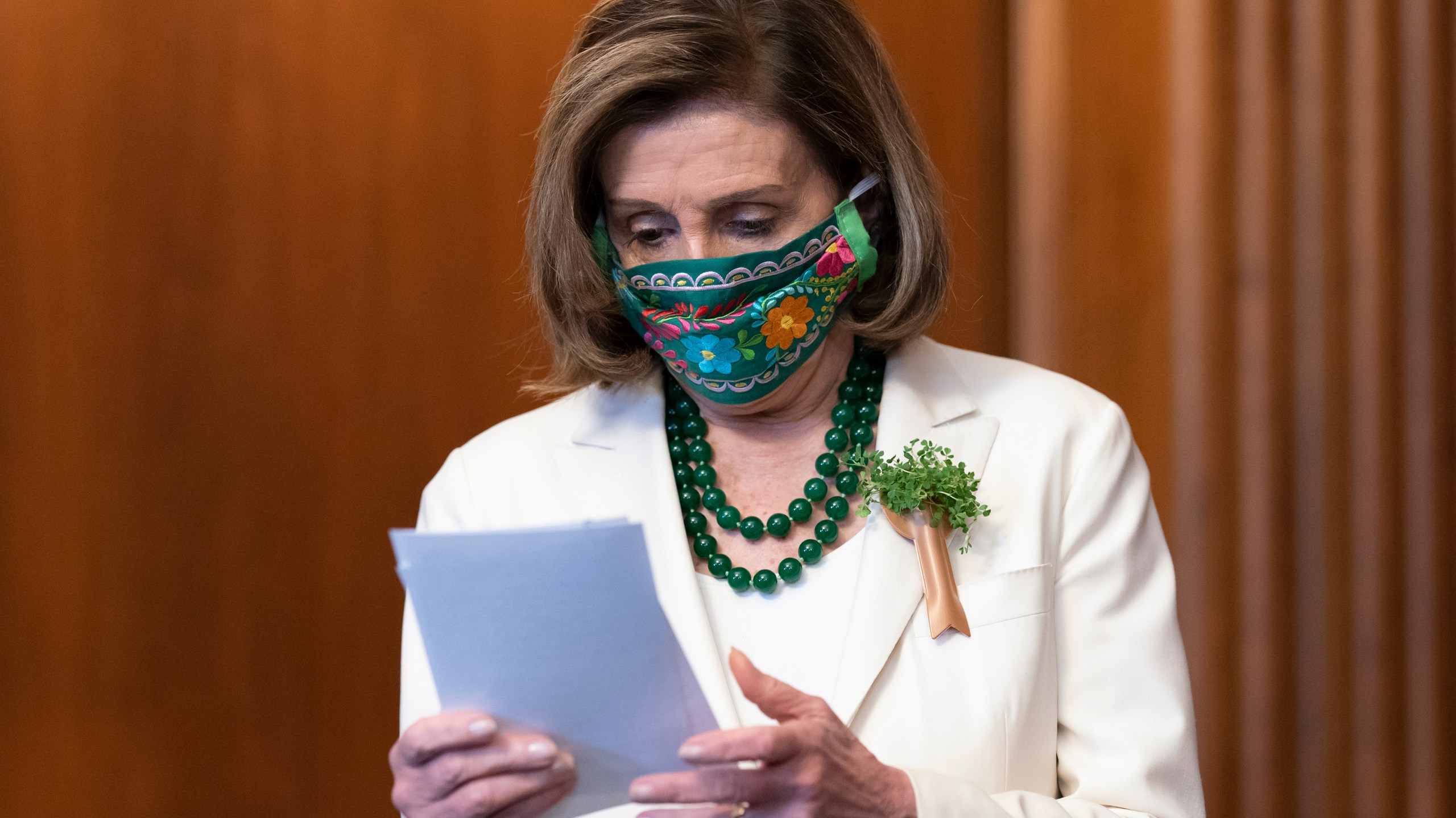 Speaker of the House Nancy Pelosi, D-Calif., looks over her notes at a news conference on reauthorizing the Violence Against Women Reauthorization Act, at the Capitol in Washington, Wednesday, March 17, 2021. (AP Photo/J. Scott Applewhite)