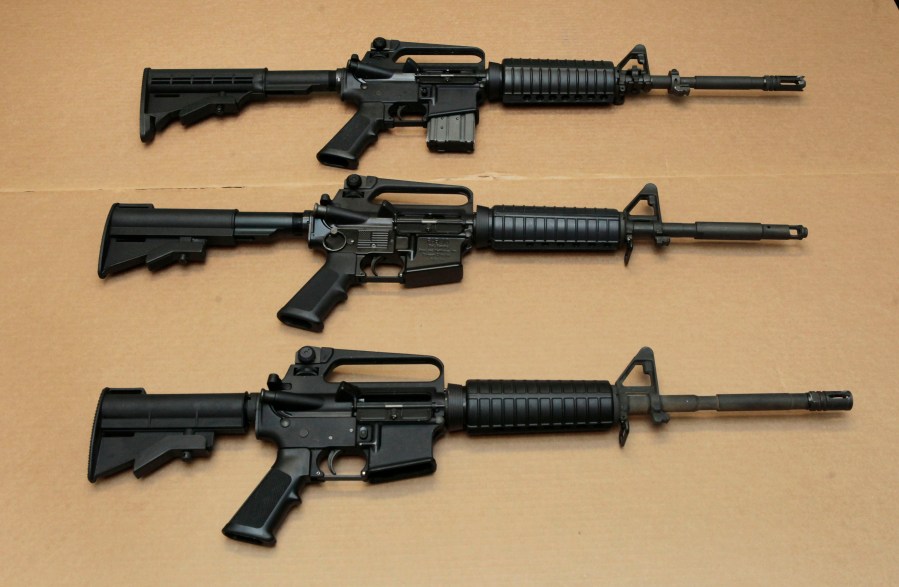 In this Aug. 15, 2012 file photo, three variations of the AR-15 assault rifle are displayed at the California Department of Justice in Sacramento. (Rich Pedroncelli/Associated Press)