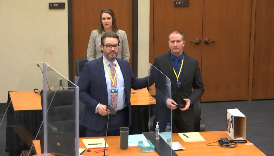 In this screen grab from video, defense attorney Eric Nelson, left, defendant and former Minneapolis police officer Derek Chauvin, right, and Nelson's assistant Amy Voss, back, introduce themselves to potential jurors as Hennepin County Judge Peter Cahill Tuesday, March 23, 2021, presides over jury selection in the trial of Chauvin at the Hennepin County Courthouse in Minneapolis, Minn. Chauvin is charged in the May 25, 2020 death of George Floyd. (Court TV, via AP, Pool)