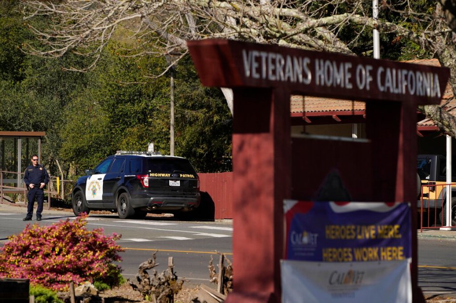 A California Highway Patrol officer guards the main entryway to the Veterans Home of California Tuesday, March 23, 2021, in Yountville, Calif. (AP Photo/Eric Risberg)