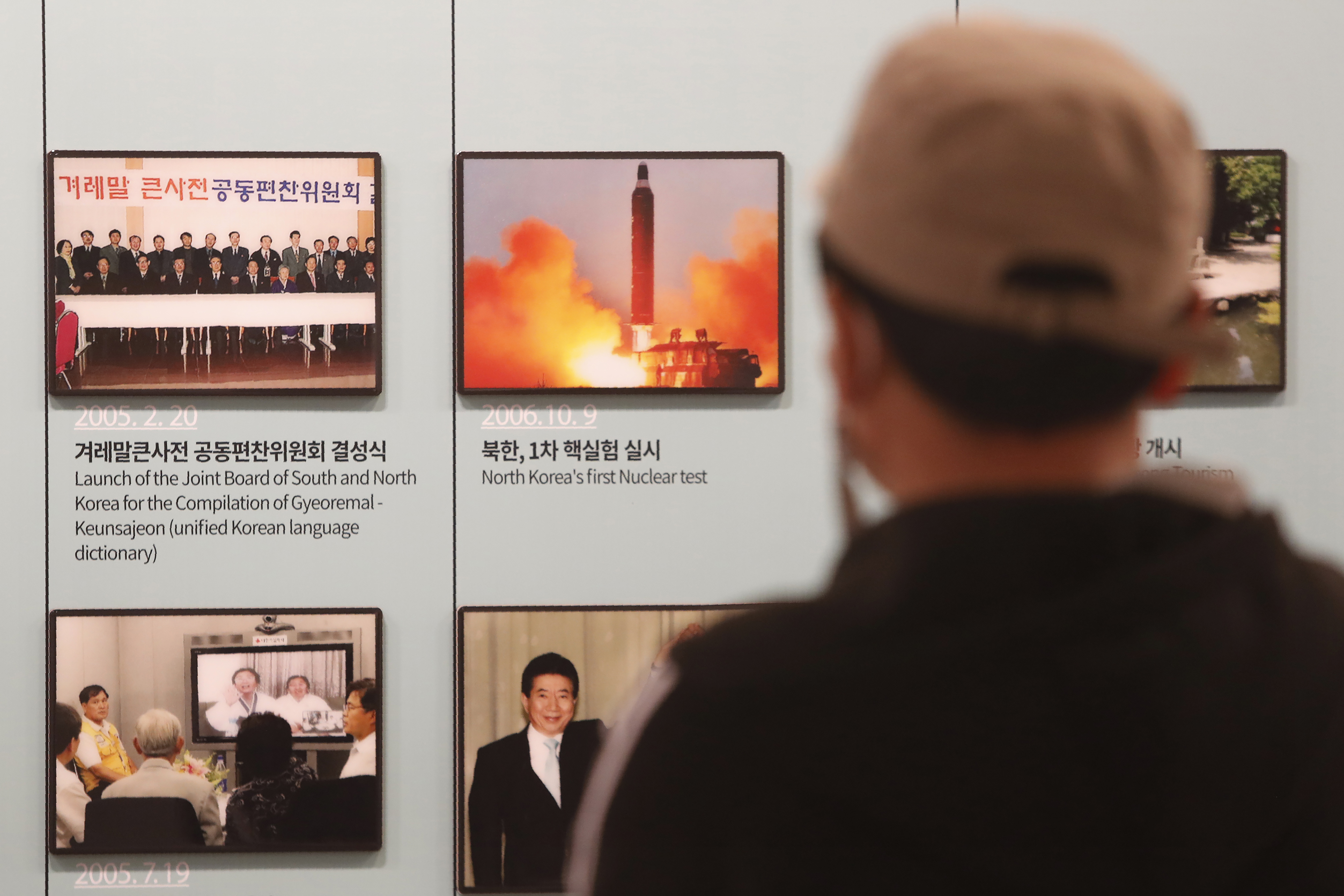 A photo showing North Korea's missile launch is displayed at the Unification Observation Post in Paju, South Korea, near the border with North Korea, on March 24, 2021. (Ahn Young-joon / Associated Press)