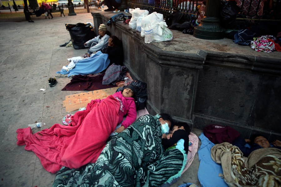 Migrants sleep under a gazebo at a park in the Mexican border city of Reynosa, Saturday, March 27, 2021. (AP Photo/Dario Lopez-Mills)