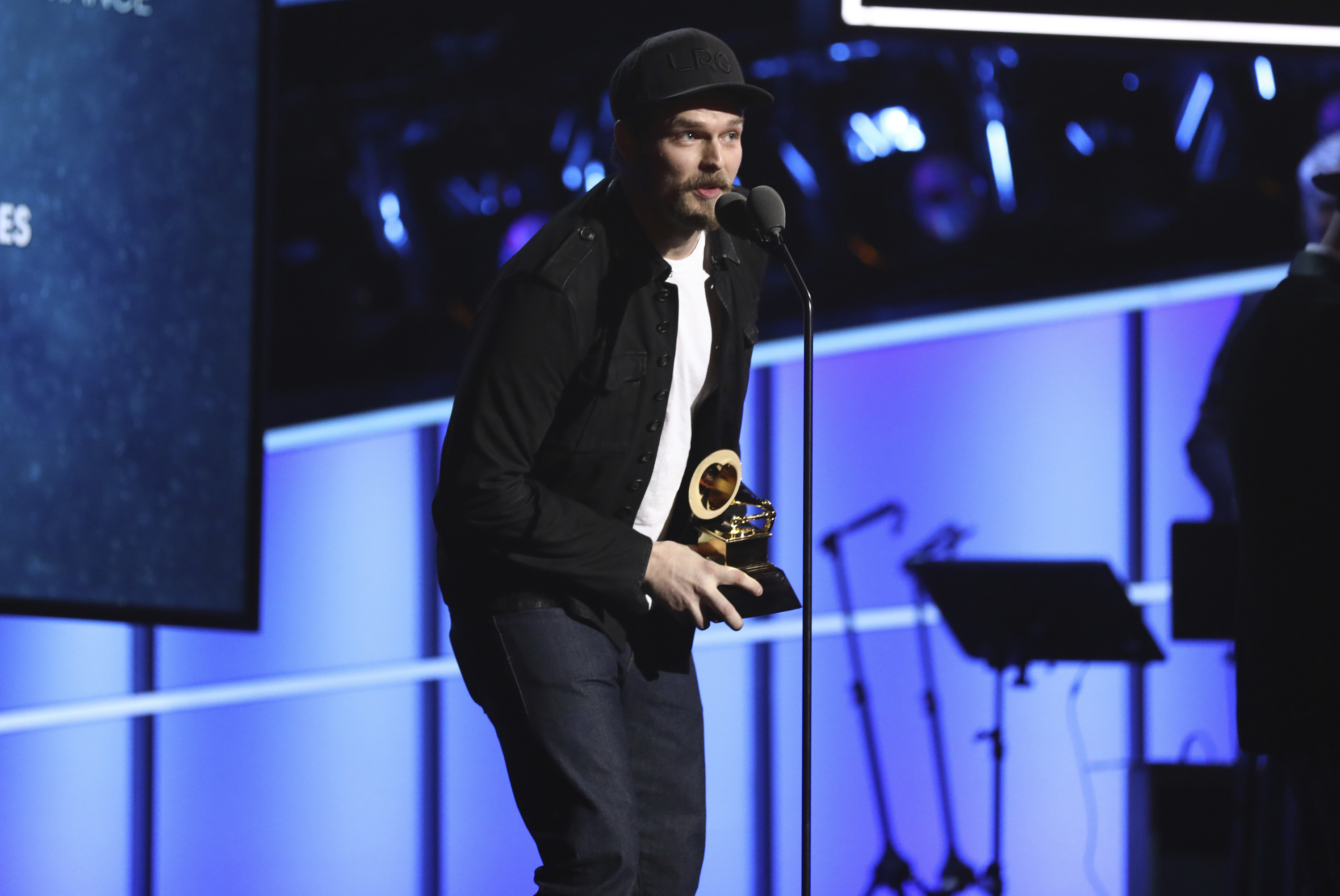 In this Sunday, Jan. 28, 2018, file photo, Steve Johnson of Alabama Shakes accepts the best American roots performance for "Killer Diller Blues" at the 60th annual Grammy Awards at Madison Square Garden in New York. Johnson, the drummer for Grammy Award-winning rock band Alabama Shakes is in custody on child abuse charges. (Matt Sayles/Invision/AP, File)