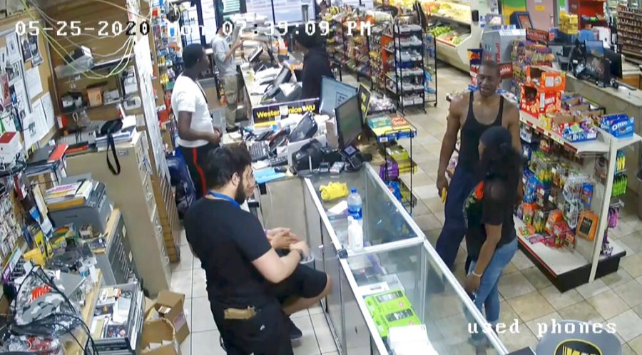 In this image from store video, George Floyd, right, is seen inside Cup Foods on May 25, 2020, in Minneapolis. (Court TV via AP, Pool)