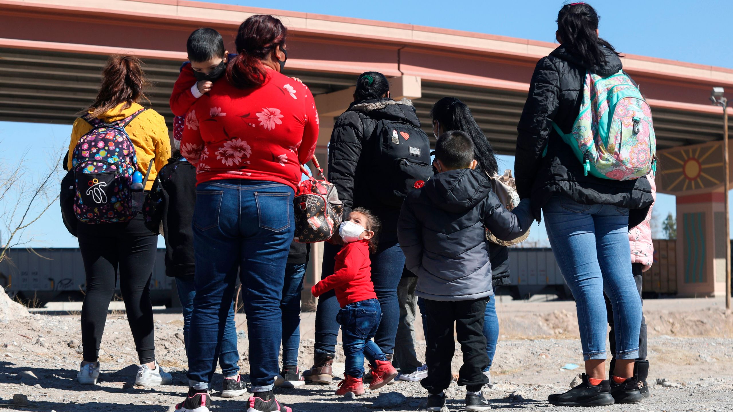 Central American migrants are seen before crossing the Rio Bravo to get to El Paso, state of Texas, US, From Ciudad Juarez, Chihuahua state, Mexico on February 5, 2021. (HERIKA MARTINEZ/AFP via Getty Images)