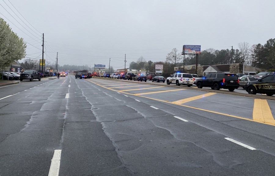 This handout photo courtesy of the Cherokee Sheriffs Office shows a line of law enforcement cars blocking the area of a shooting at a spa in an Atlanta suburb on March 16, 2021. (Cherokee Sheriffs Office/AFP via Getty Images)