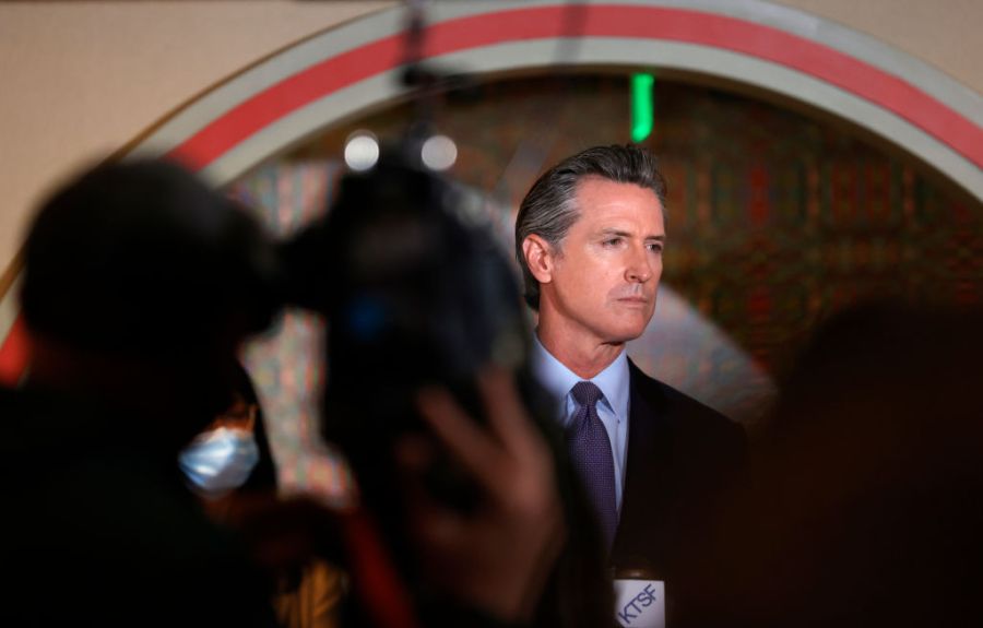 California Gov. Gavin Newsom, right, looks on during a news conference with Bay Area AAPI leaders at the Chinese Culture Center of San Francisco on March 19, 2021 in San Francisco, California. (Justin Sullivan/Getty Images)