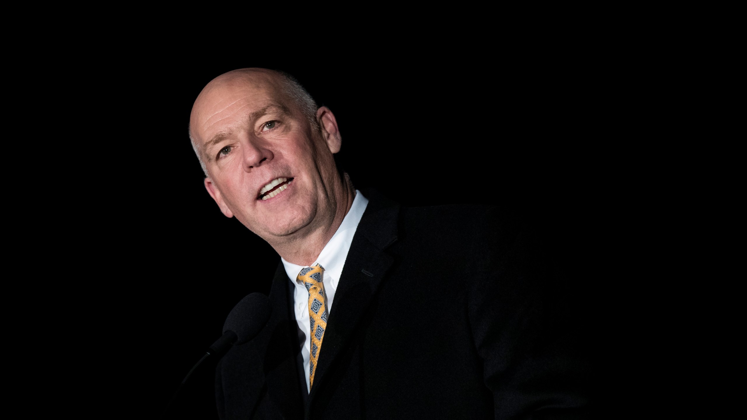 In this file photo, then-Rep. Greg Gianforte (R-MT) speaks during the U.S. Capitol Christmas Tree lighting ceremony on December 6, 2017 in Washington, DC. (Drew Angerer/Getty Images)