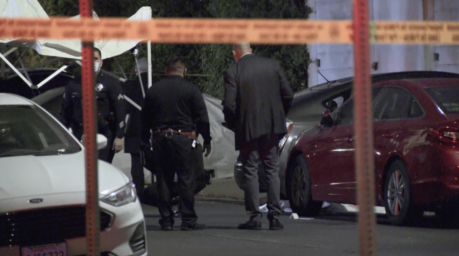 Authorities respond to investigate a deadly shooting in the Fairfax district of Los Angeles on Feb. 26, 2021. (KTLA)