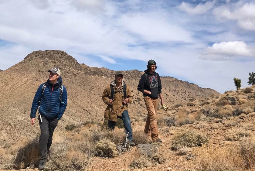 From left, Bryan Hatchell, spokesman for the nonprofit Friends of the Inyo, Jeremiah Joseph, spokesman for the Lone Pine Paiute Shoshone Tribe, and Seth Tsosie, also of the tribe, walk in the area where K2 Gold Corp. of Vancouver, Canada, is conducting exploratory drilling.(Luis Sahagun / Los Angeles Times)