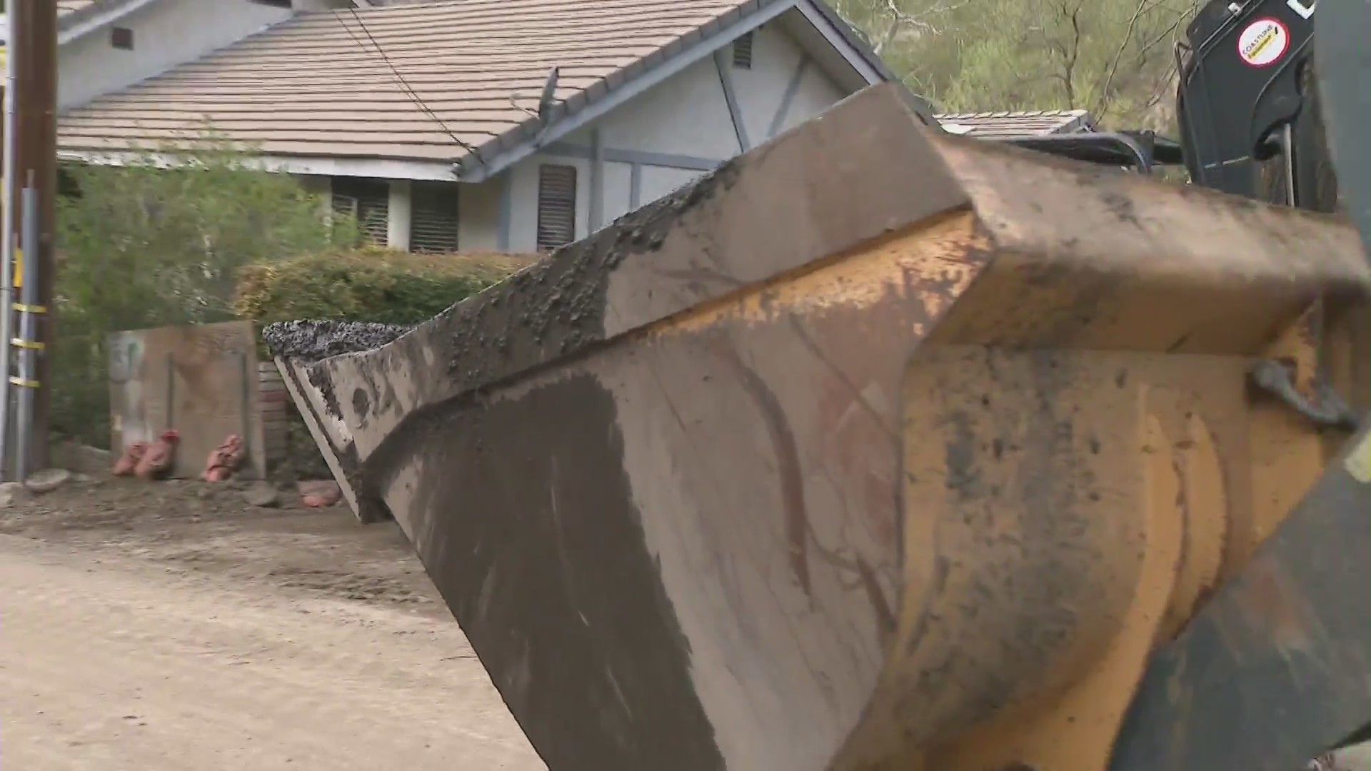 The mud clean-up continues in Silverado Canyon on March 14, 2021. (KTLA)