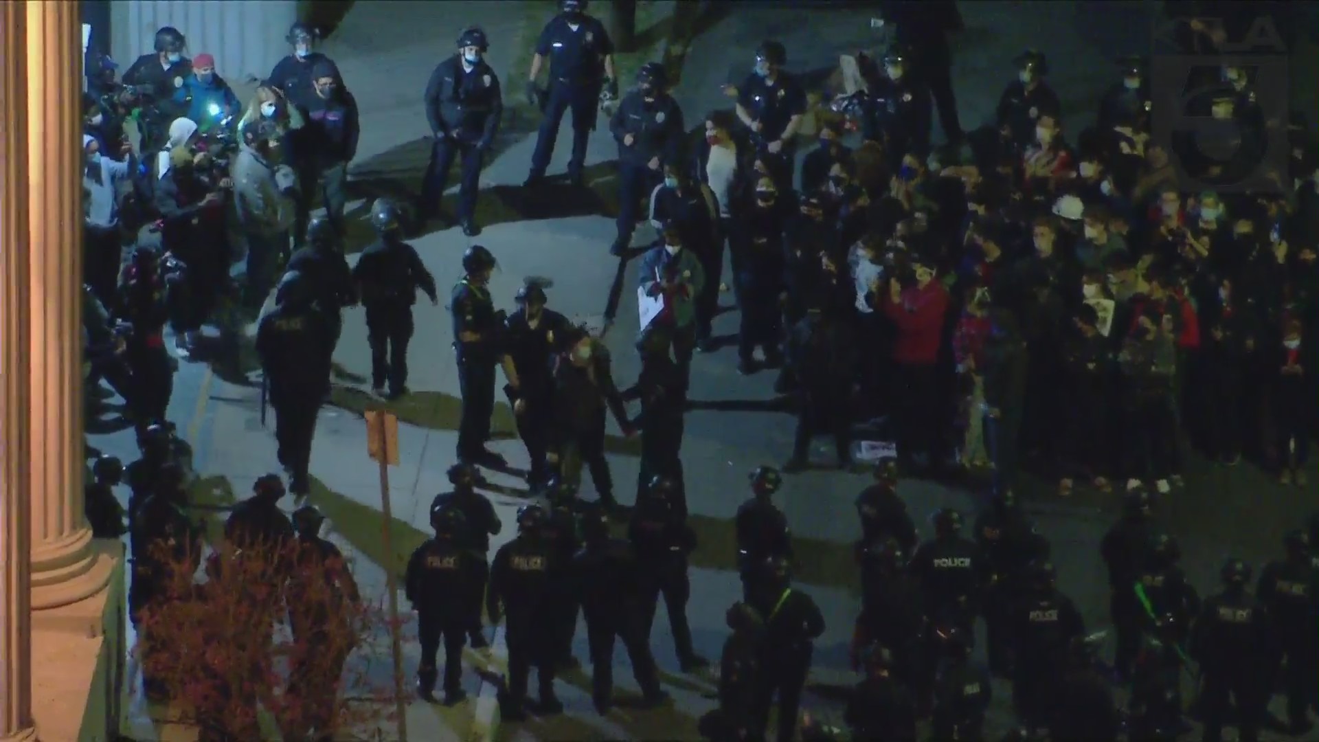 Police make arrests after declaring an unlawful assembly surrounding an Echo Park protest on March 25, 2021. (KTLA)