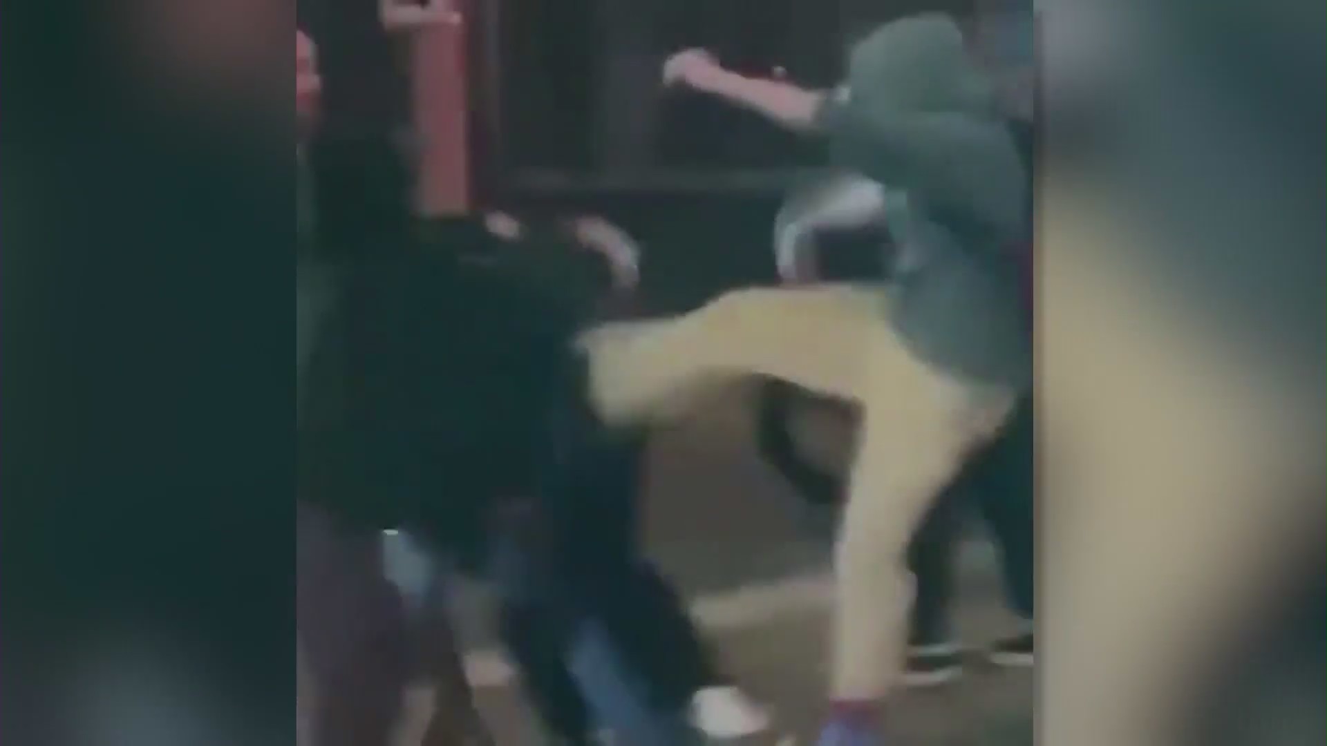 Police are investigating a social media video showing a group of teens beating a man in Newport Beach.