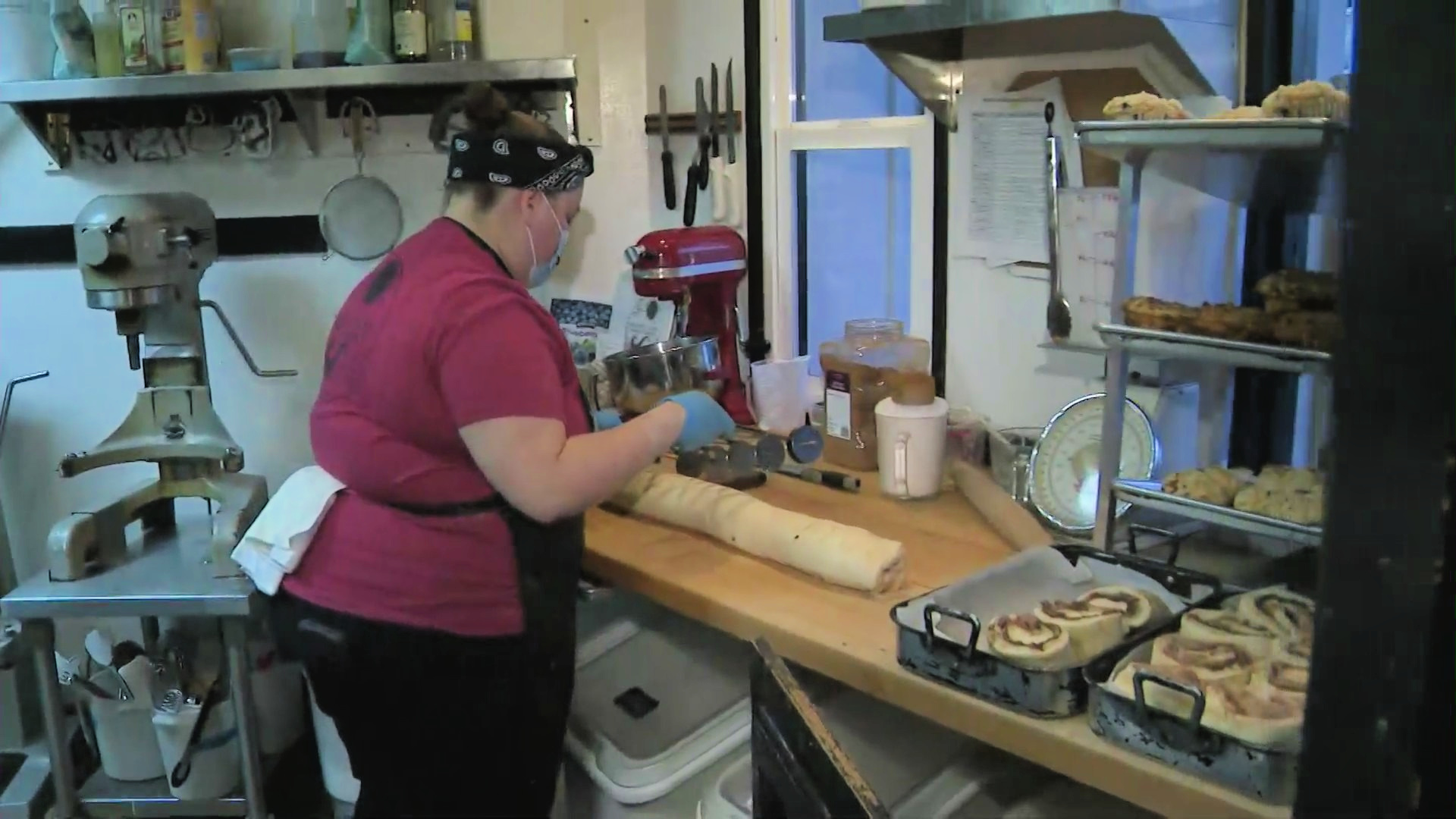 Cinnamon buns are made at Balboa Island Baking Company on March 27, 2021. (KTLA)