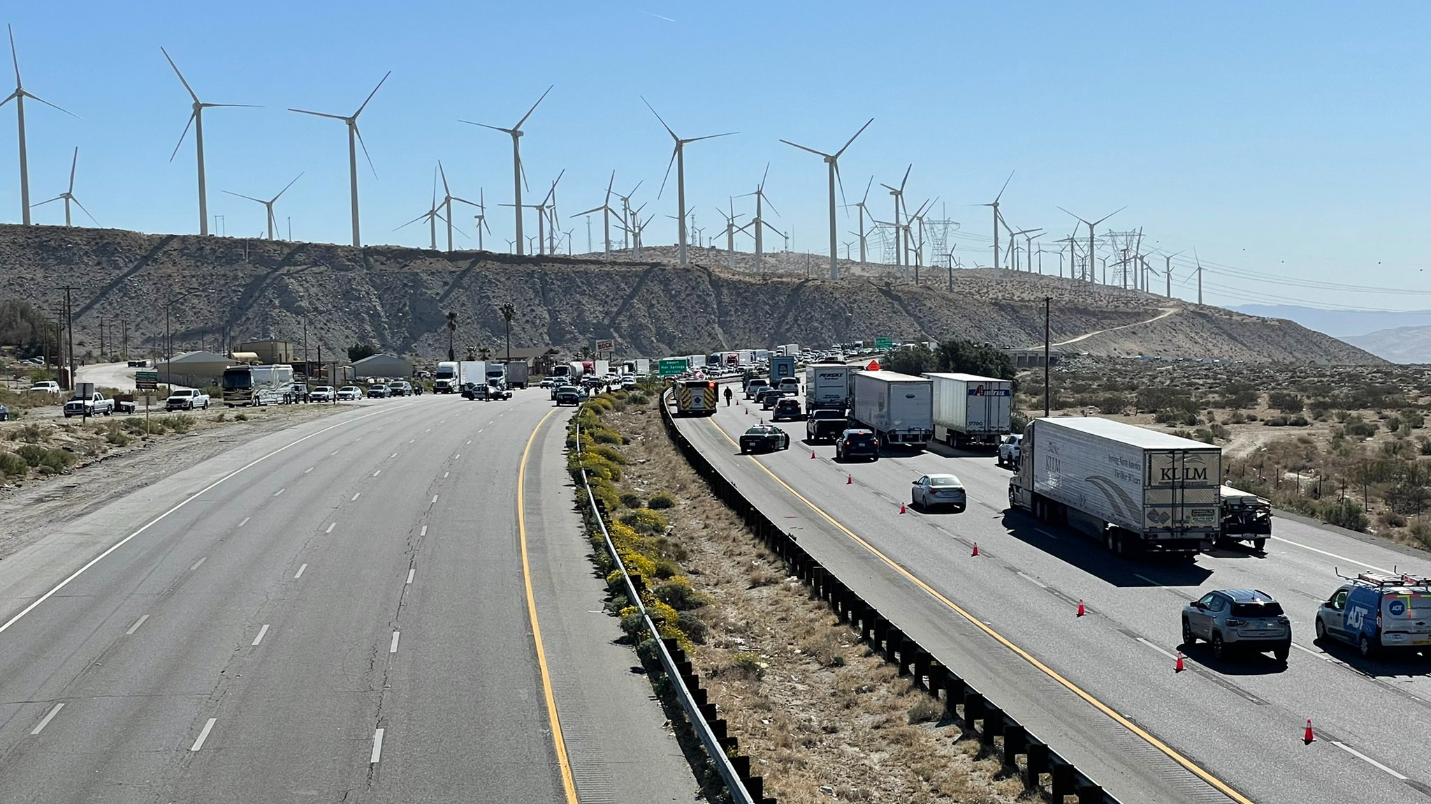 Traffic is backed up on the 10 Freeway after a deputy's shooting of a vandalism suspect shut down the westbound lanes on April 9, 2021, in an image released by the California Highway Patrol.
