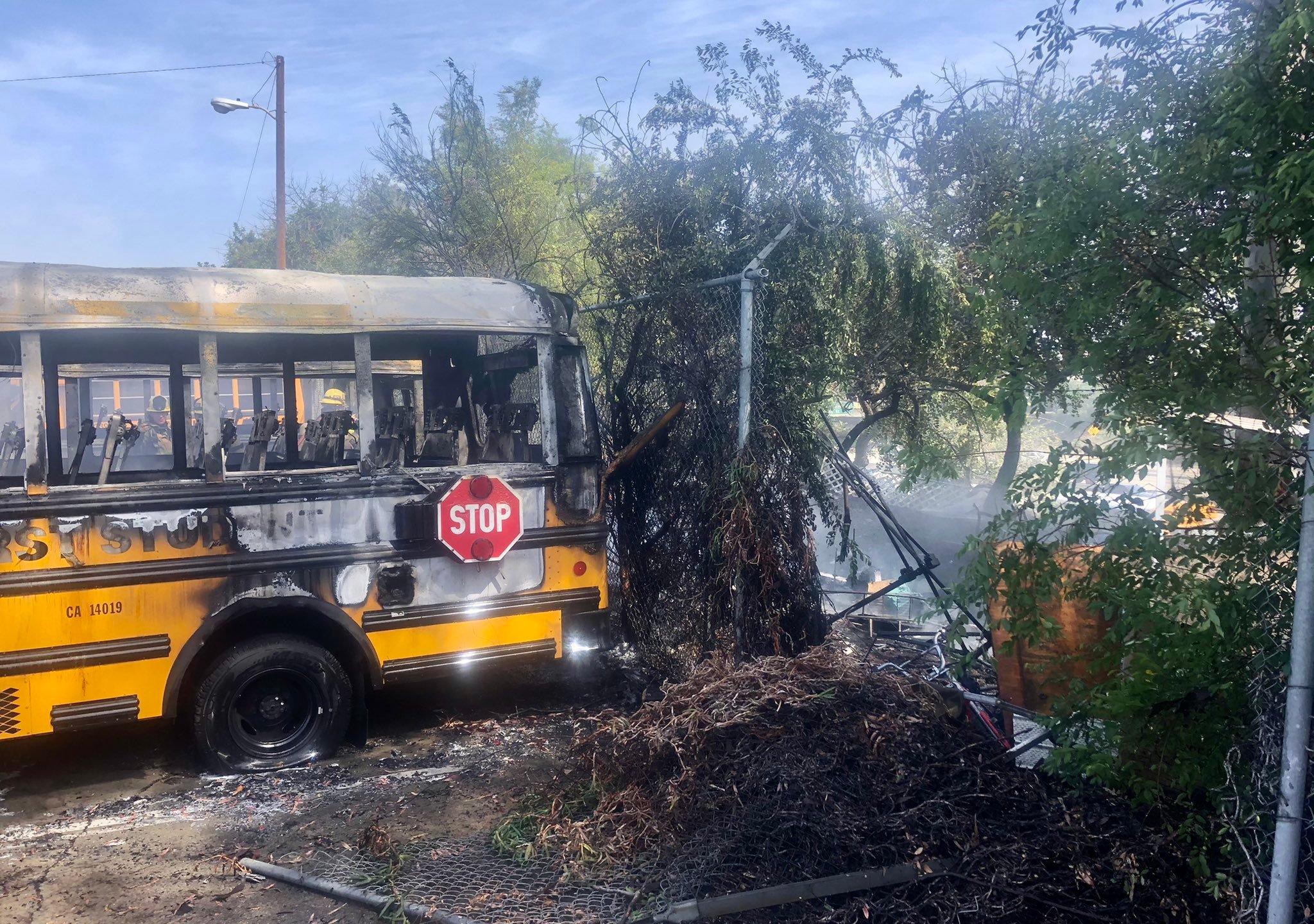 A small brush fire in Long Beach charred multiple unoccupied school buses on April 15, 2021. (Long Beach Fire Department)