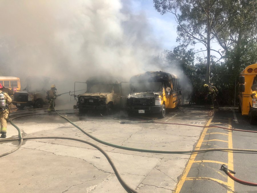 A small brush fire in Long Beach charred multiple unoccupied school buses on April 15, 2021. (Long Beach Fire Department)