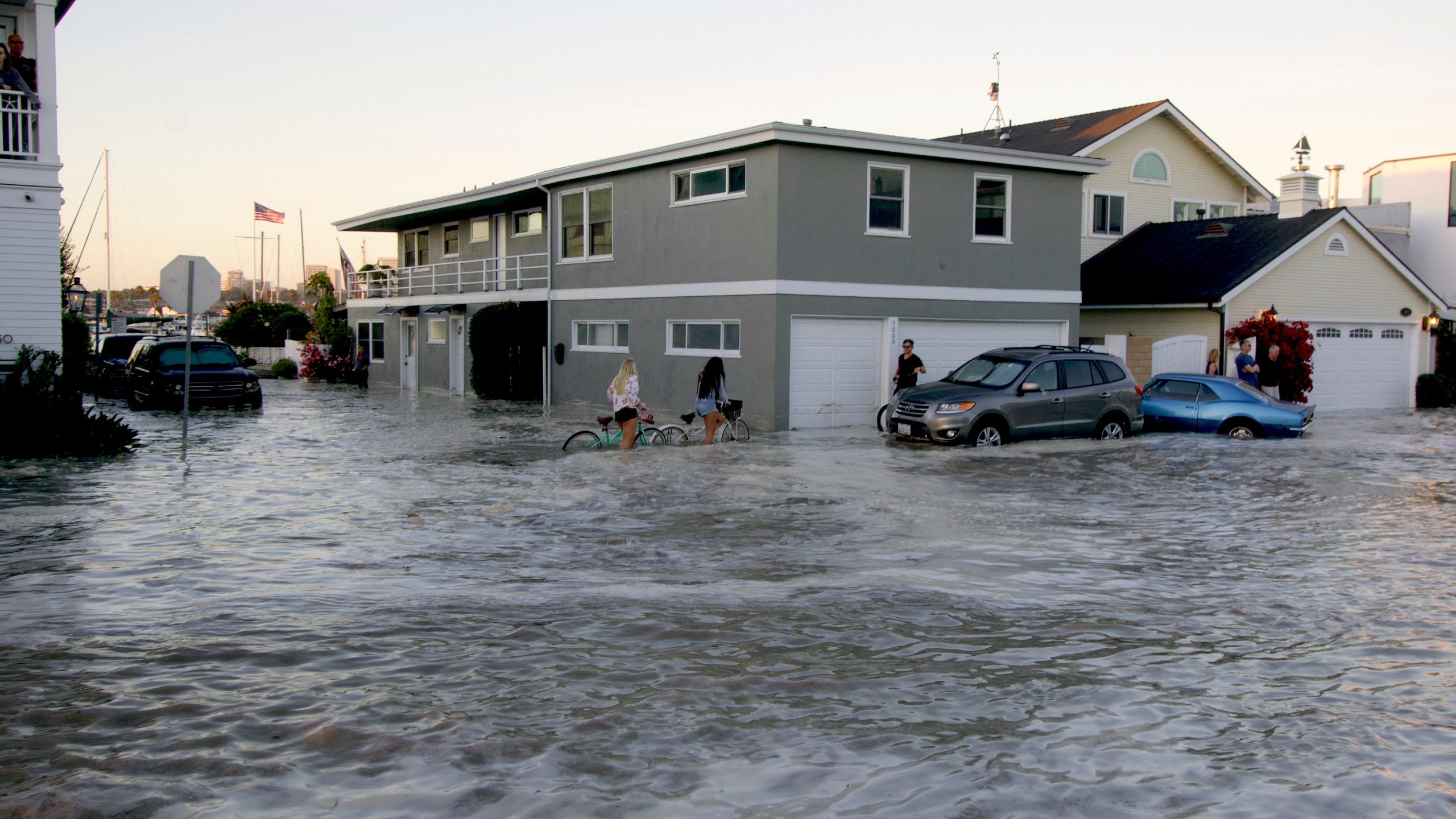 Streets in the Balboa Peninsula were flooded by coastal tides and high surf in Newport Beach, Calif., on July 3, 2020. (AP Photo/Matt Hartman)