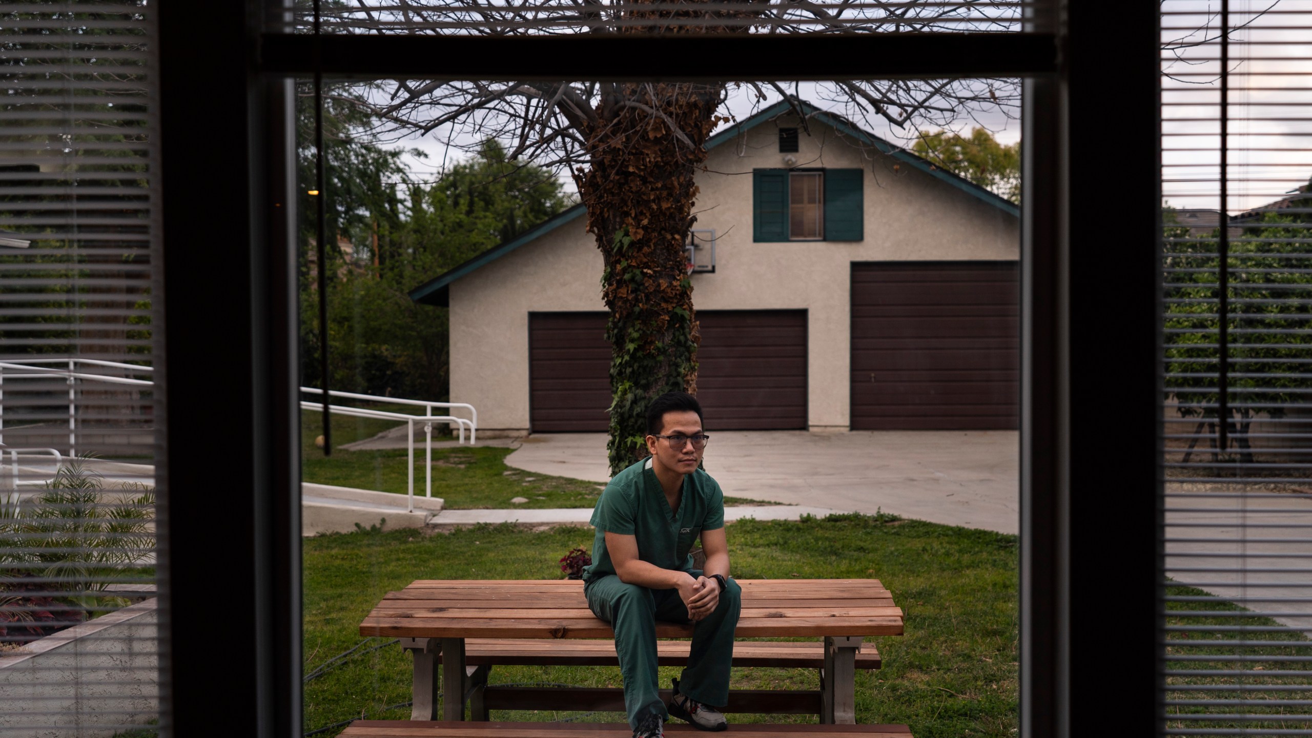 ICU nurse Meynard Villa poses for photos in his start-up senior care home in Arcadia, Calif., Thursday, March 25, 2021. Villa was on the verge of losing his family’s $150,000 investment in his new senior care home because he couldn't hire workers while grappling with a glitchy state system designed to automate criminal background checks.(AP Photo/Jae C. Hong)