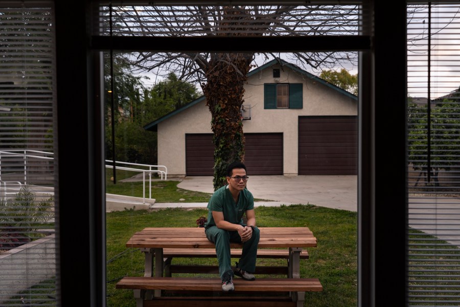 ICU nurse Meynard Villa poses for photos in his start-up senior care home in Arcadia, Calif., Thursday, March 25, 2021. Villa was on the verge of losing his family’s $150,000 investment in his new senior care home because he couldn't hire workers while grappling with a glitchy state system designed to automate criminal background checks.(AP Photo/Jae C. Hong)