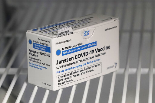 A box of the Johnson & Johnson COVID-19 vaccine is shown in a refrigerator at the Yakima Valley Farm Workers Clinic in Toppenish, Wash., Thursday, March 25, 2021. (AP Photo/Ted S. Warren)