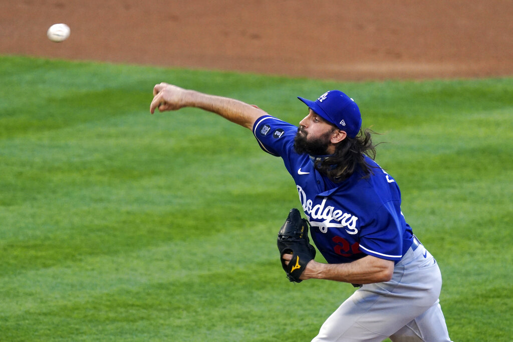 Los Angeles Dodgers starting pitcher Tony Gonsolin throws to the plate during the first inning of a spring training exhibition baseball game against the Los Angeles Angels Sunday, March 28, 2021, in Anaheim, Calif. (AP Photo/Mark J. Terrill)