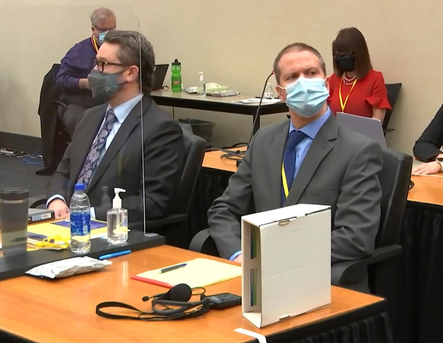 In this March 29, 2021 file image from video, defense attorney Eric Nelson, left, and former Minneapolis police officer Derek Chauvin listen as Hennepin County Judge Peter Cahill presides over pre-trial motions prior to opening statements in the trial of Chauvin for the May 25, 2020, death of George Floyd at the Hennepin County Courthouse in Minneapolis, Minn. (Court TV via AP, Pool, File)