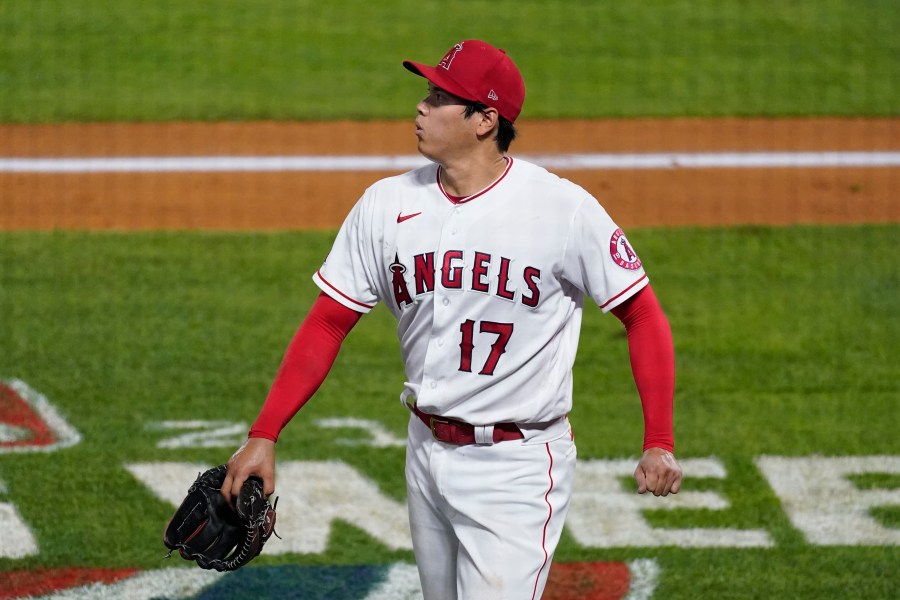 Los Angeles Angels starting pitcher Shohei Ohtani walks off the field during the fifth inning of the team's baseball game against the Chicago White Sox on Sunday, April 4, 2021, in Anaheim, Calif. (AP Photo/Ashley Landis)