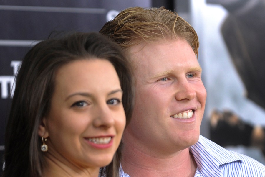 In this Aug. 2, 2010, file photo, Andrew Giuliani, right, son of former New York City Mayor Rudy Giuliani, attends the world premiere of "The Other Guys" with former Olympic figure skater Sarah Hughes at the Ziegfeld Theatre in New York. (Evan Agostini/Associated Press)