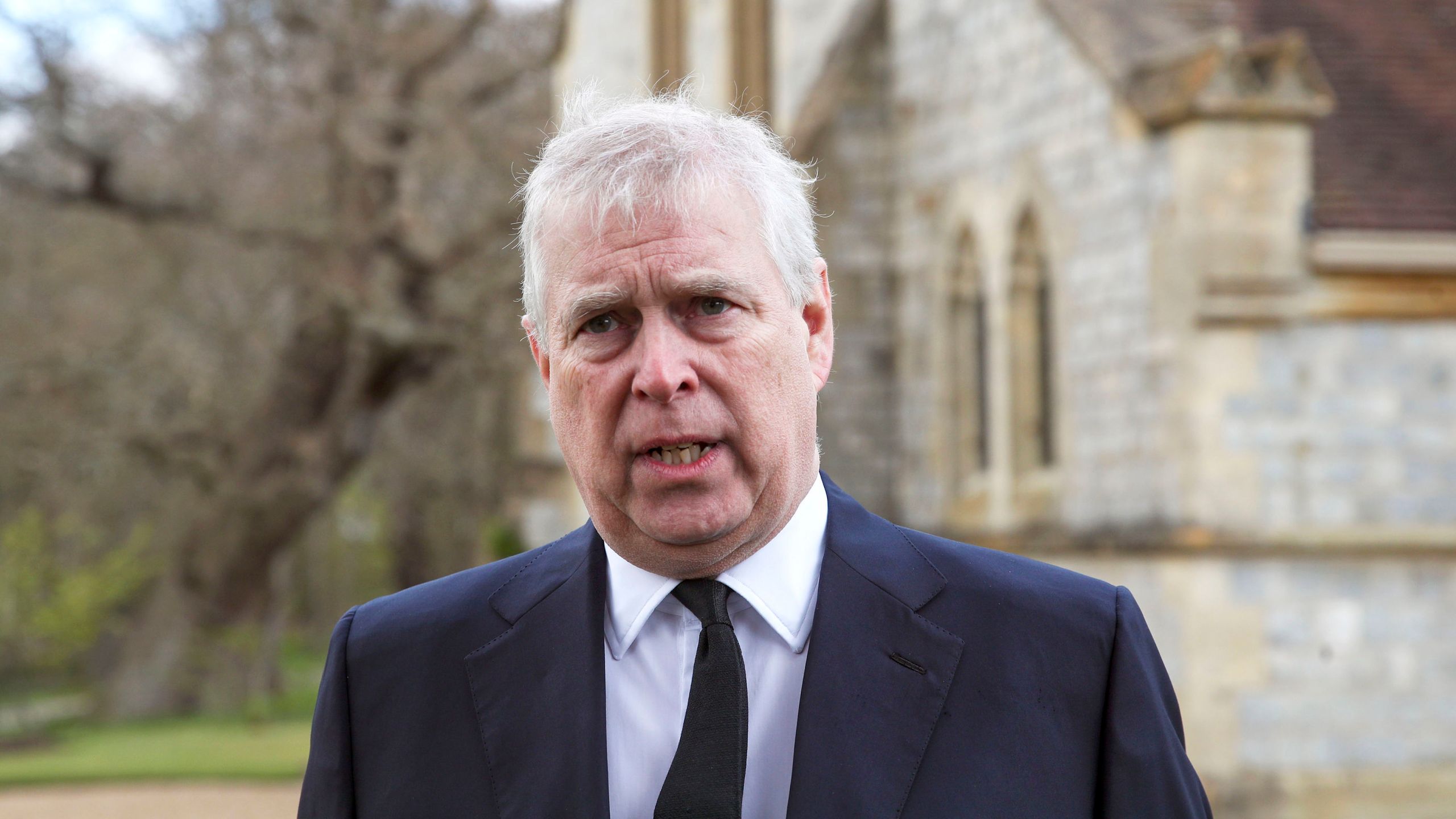 Britain's Prince Andrew during a television interview at the Royal Chapel of All Saints at Royal Lodge, Windsor, following the announcement of Prince Philip, in England, Sunday, April 11, 2021. (Steve Parsons/Pool Photo via AP)