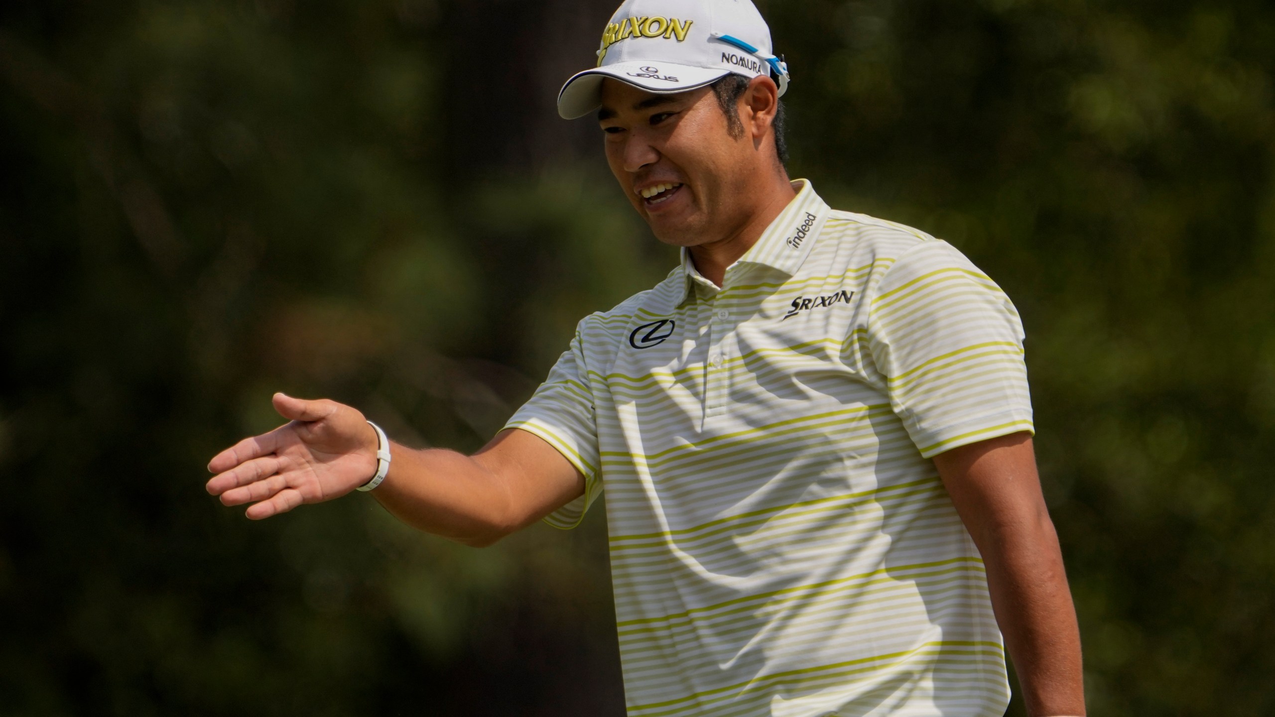 Hideki Matsuyama, of Japan, reacts after a bogey on the first hole during the final round of the Masters golf tournament on Sunday, April 11, 2021, in Augusta, Ga. (AP Photo/David J. Phillip)