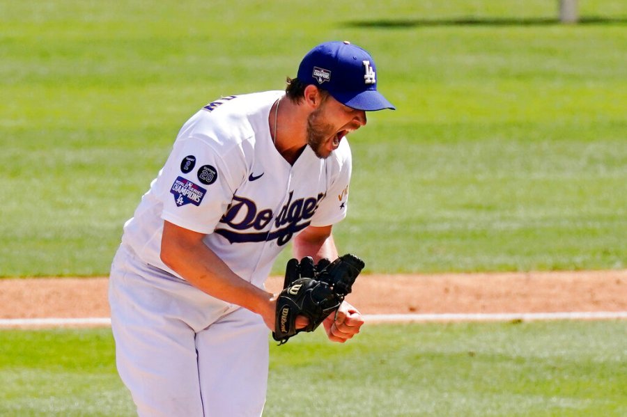 Los Angeles Dodgers starting pitcher Clayton Kershaw celebrates after striking out Washington Nationals' Jordy Mercer to end the top of the sixth inning of a baseball game Sunday, April 11, 2021, in Los Angeles. (AP Photo/Mark J. Terrill)