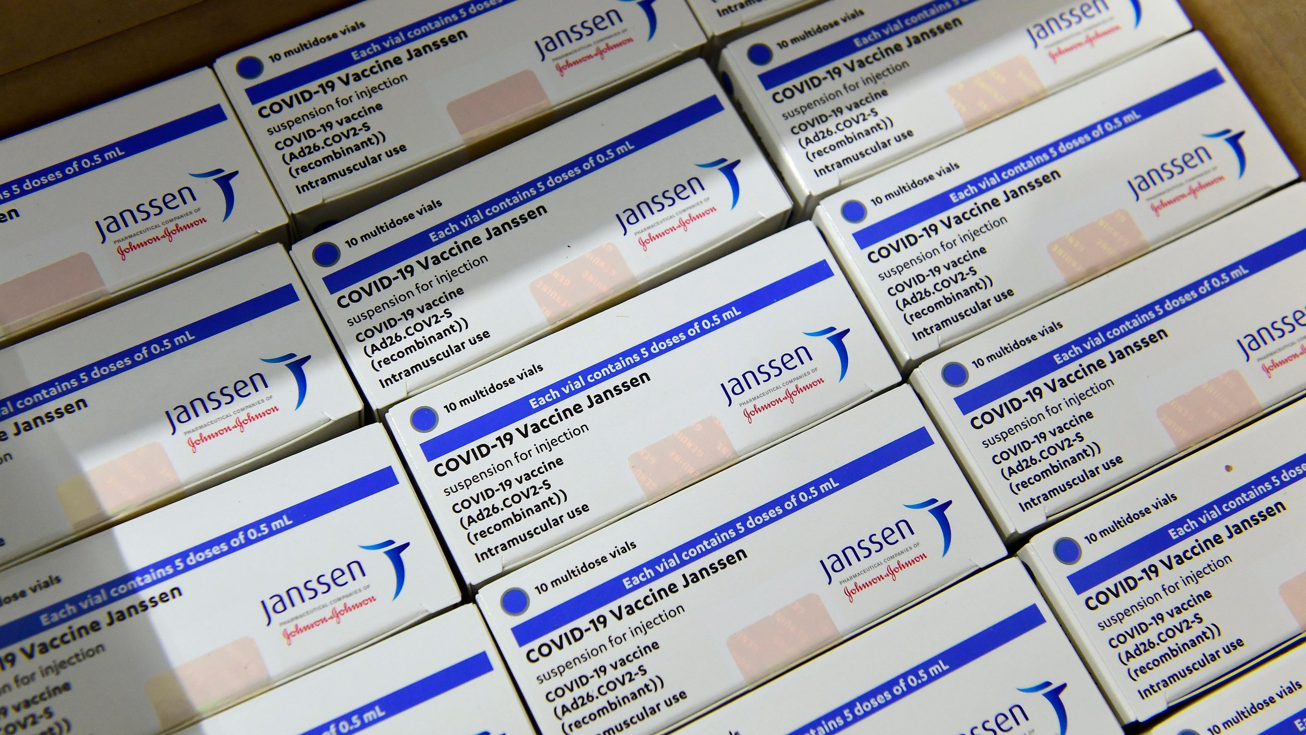 Boxes of Janssen vaccines sit at a warehouse of Hungaropharma, a Hungarian pharmaceutical wholesale company, in Budapest, Hungary, after the arrival of the first batch of the Johnson & Johnson, US, made one-dose vaccine against the new coronavirus in the country Tuesday, April 13, 2021. The first shopment contains 28 thousand doses of Janssen. (Szilard Koszticsak/MTI via AP)