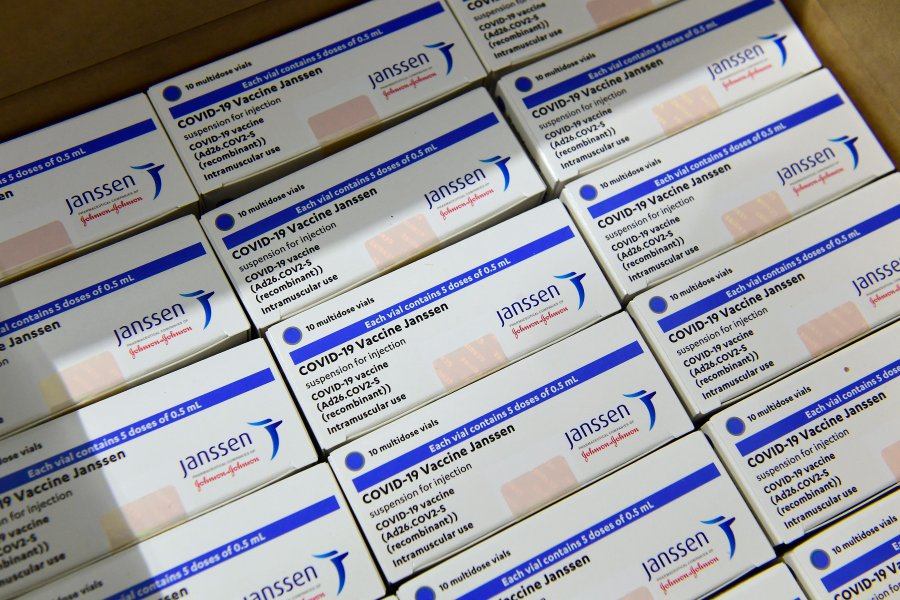 Boxes of Janssen vaccines sit at a warehouse of Hungaropharma, a Hungarian pharmaceutical wholesale company, in Budapest, Hungary, after the arrival of the first batch of the Johnson & Johnson, US, made one-dose vaccine against the new coronavirus in the country Tuesday, April 13, 2021. The first shopment contains 28 thousand doses of Janssen. (Szilard Koszticsak/MTI via AP)