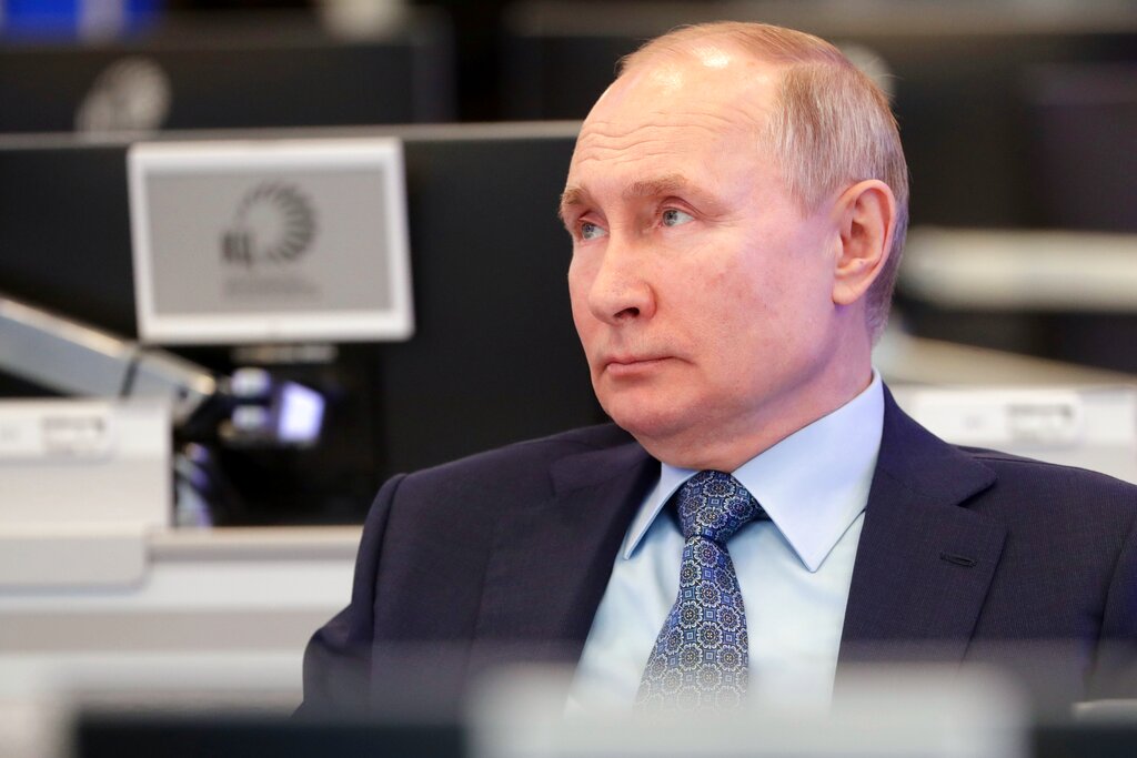 Russian President Vladimir Putin visits the Coordination Center of the Russian Government in Moscow, Russia, Tuesday, April 13, 2021. (Mikhail Metzel, Sputnik, Kremlin Pool Photo via AP)