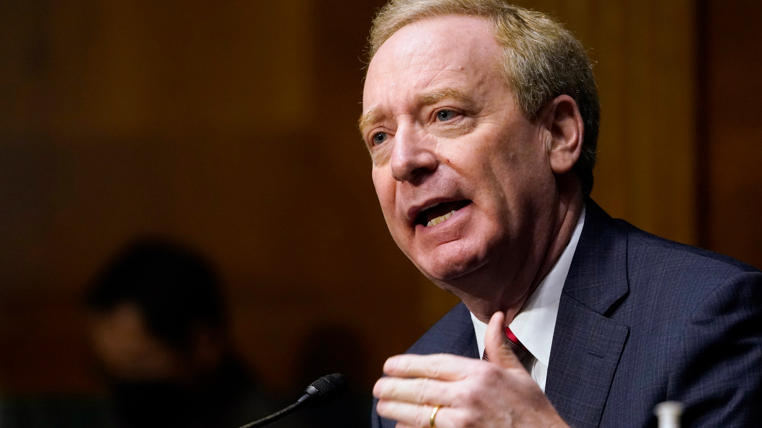 In this Feb. 23, 2021, file photo Brad Smith, president of Microsoft Corporation, speaks on Capitol Hill in Washington during a hearing on emerging technologies and their impact on national security. (AP Photo/Susan Walsh, File)