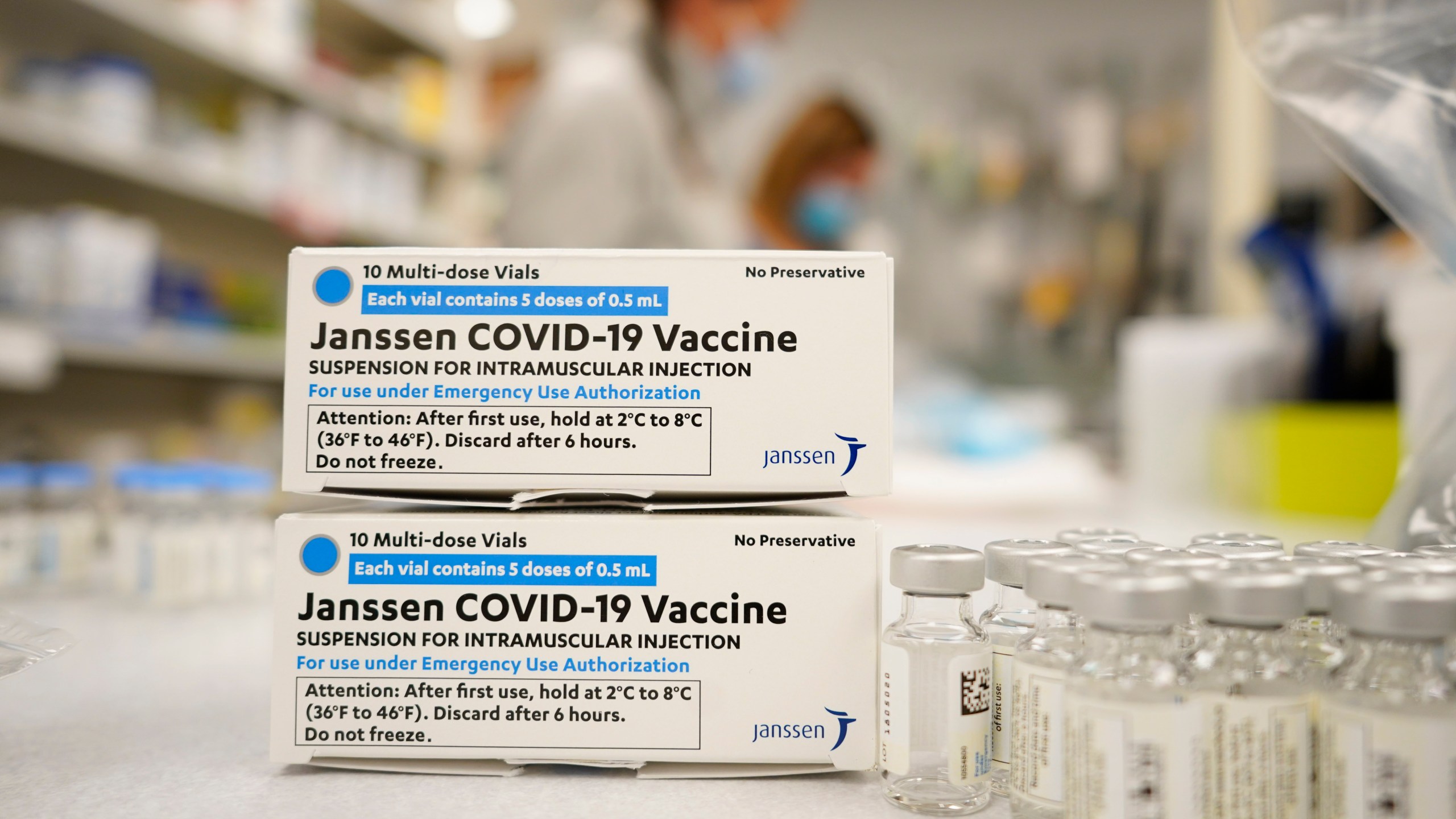 In this March 6, 2021, file photo, boxes stand next vials of Johnson & Johnson COVID-19 vaccine in Denver. (AP Photo/David Zalubowski, File)