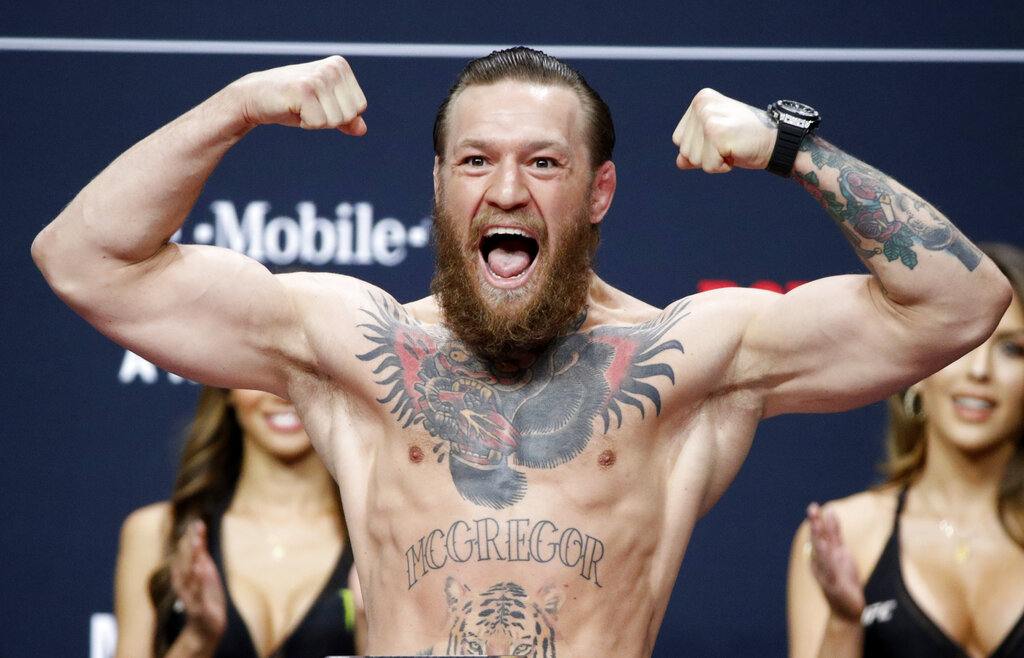 Conor McGregor poses during a ceremonial weigh-in for the UFC 246 mixed martial arts bout in Las Vegas, in this Friday, Jan. 17, 2020, file photo. (AP Photo/John Locher, File)