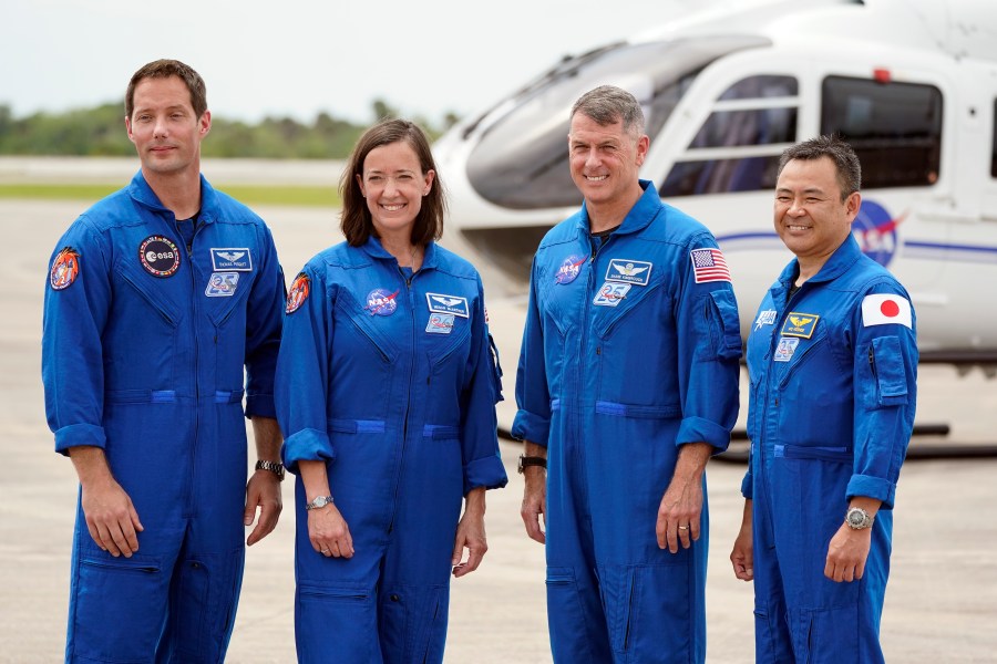 SpaceX Crew 2 members, from left, European Space Agency astronaut Thomas Pesquet, NASA astronauts Megan McArthur and Shane Kimbrough and Japan Aerospace Exploration Agency astronaut Akihiko Hoshide gather at the Kennedy Space Center in Cape Canaveral, Florida, Friday, April 16, 2021 to prepare for a mission to the International Space Station. The launch is targeted for April 22. (AP Photo/John Raoux)